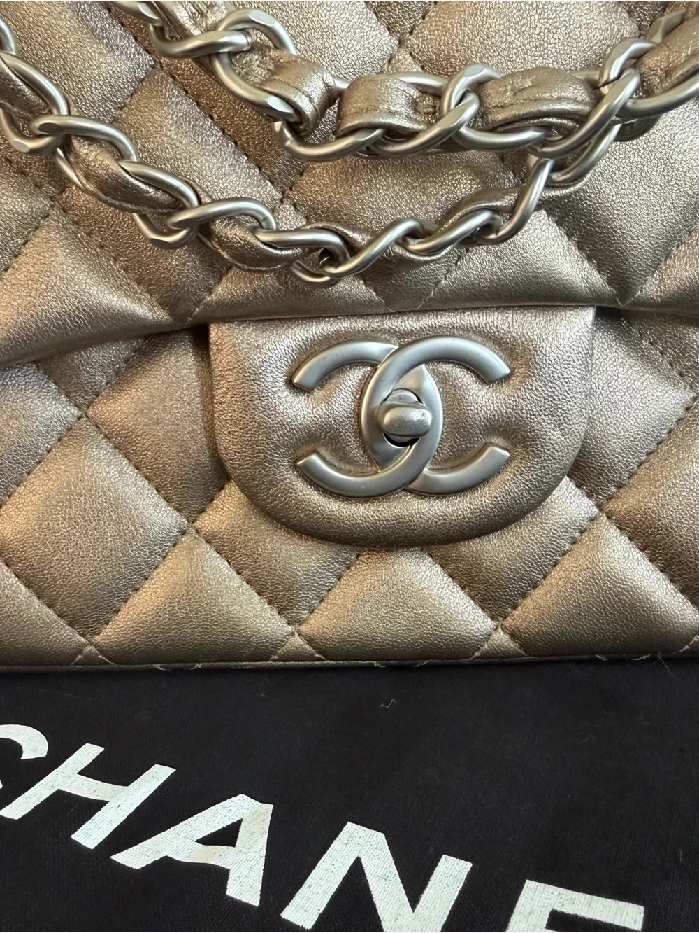 CHANEL Maxi Double Flap Bag in Metallic Gold Lambskin Leather